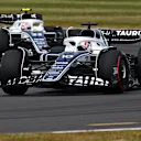 NORTHAMPTON, ENGLAND - JULY 03: Pierre Gasly of France driving the (10) Scuderia AlphaTauri AT03 leads Yuki Tsunoda of Japan driving the (22) Scuderia AlphaTauri AT03 during the F1 Grand Prix of Great Britain at Silverstone on July 03, 2022 in Northampton, England. (Photo by Clive Mason/Getty Images)