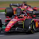 NORTHAMPTON, ENGLAND - JULY 03: Carlos Sainz of Spain driving (55) the Ferrari F1-75 ahead of Charles Leclerc of Monaco driving (16) the Ferrari F1-75 during the F1 Grand Prix of Great Britain at Silverstone on July 03, 2022 in Northampton, England. (Photo by Bryn Lennon - Formula 1/Formula 1 via Getty Images)
