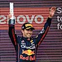 NORTHAMPTON, ENGLAND - JULY 03: Second placed Sergio Perez of Mexico and Oracle Red Bull Racing celebrates on the podium during the F1 Grand Prix of Great Britain at Silverstone on July 03, 2022 in Northampton, England. (Photo by Clive Mason/Getty Images)