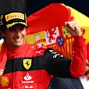 NORTHAMPTON, ENGLAND - JULY 03: Race winner Carlos Sainz of Spain and Ferrari celebrates on the podium during the F1 Grand Prix of Great Britain at Silverstone on July 03, 2022 in Northampton, England. (Photo by Clive Rose/Getty Images)