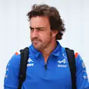 BUDAPEST, HUNGARY - JULY 29: Fernando Alonso of Spain and Alpine F1 looks on in the Paddock prior to practice ahead of the F1 Grand Prix of Hungary at Hungaroring on July 29, 2022 in Budapest, Hungary. (Photo by Bryn Lennon - Formula 1/Formula 1 via Getty Images)
