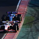 BUDAPEST, HUNGARY - JULY 29: Mick Schumacher of Germany driving the (47) Haas F1 VF-22 Ferrari leads Fernando Alonso of Spain driving the (14) Alpine F1 A522 Renault  during practice ahead of the F1 Grand Prix of Hungary at Hungaroring on July 29, 2022 in Budapest, Hungary. (Photo by Dan Istitene - Formula 1/Formula 1 via Getty Images)