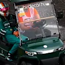 BUDAPEST, HUNGARY - JULY 30: Sebastian Vettel of Germany and Aston Martin F1 Team gets a lift back to the paddock after spinning during final practice ahead of the F1 Grand Prix of Hungary at Hungaroring on July 30, 2022 in Budapest, Hungary. (Photo by Dan Istitene - Formula 1/Formula 1 via Getty Images)