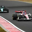 BUDAPEST, HUNGARY - JULY 31: Valtteri Bottas of Finland driving the (77) Alfa Romeo F1 C42 Ferrari leads Lance Stroll of Canada driving the (18) Aston Martin AMR22 Mercedes during the F1 Grand Prix of Hungary at Hungaroring on July 31, 2022 in Budapest, Hungary. (Photo by Dan Mullan/Getty Images)