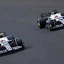 BUDAPEST, HUNGARY - JULY 31: Yuki Tsunoda of Japan driving the (22) Scuderia AlphaTauri AT03 and Pierre Gasly of France driving the (10) Scuderia AlphaTauri AT03 during the F1 Grand Prix of Hungary at Hungaroring on July 31, 2022 in Budapest, Hungary. (Photo by Dan Istitene - Formula 1/Formula 1 via Getty Images)
