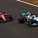 BUDAPEST, HUNGARY - JULY 31: George Russell of Great Britain driving the (63) Mercedes AMG Petronas F1 Team W13 leads Charles Leclerc of Monaco driving the (16) Ferrari F1-75 during the F1 Grand Prix of Hungary at Hungaroring on July 31, 2022 in Budapest, Hungary. (Photo by Dan Istitene - Formula 1/Formula 1 via Getty Images)