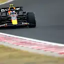 BUDAPEST, HUNGARY - JULY 31: Sergio Perez of Mexico driving the (11) Oracle Red Bull Racing RB18 on track during the F1 Grand Prix of Hungary at Hungaroring on July 31, 2022 in Budapest, Hungary. (Photo by Francois Nel/Getty Images)