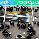 BUDAPEST, HUNGARY - JULY 31: Lewis Hamilton of Great Britain driving the (44) Mercedes AMG Petronas F1 Team W13 makes a pitstop during the F1 Grand Prix of Hungary at Hungaroring on July 31, 2022 in Budapest, Hungary. (Photo by Mark Thompson/Getty Images)