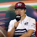 BUDAPEST, HUNGARY - JULY 28: Yuki Tsunoda of Japan and Scuderia AlphaTauri talks in the Drivers Press Conference during previews ahead of the F1 Grand Prix of Hungary at Hungaroring on July 28, 2022 in Budapest, Hungary. (Photo by Bryn Lennon/Getty Images)
