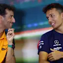 BUDAPEST, HUNGARY - JULY 28: Daniel Ricciardo of Australia and McLaren and Alexander Albon of Thailand and Williams talk in the Drivers Press Conference during previews ahead of the F1 Grand Prix of Hungary at Hungaroring on July 28, 2022 in Budapest, Hungary. (Photo by Bryn Lennon/Getty Images)