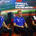 BUDAPEST, HUNGARY - JULY 28: Esteban Ocon of France and Alpine F1, Kevin Magnussen of Denmark and Haas F1 and Valtteri Bottas of Finland and Alfa Romeo F1 look on in the Drivers Press Conference during previews ahead of the F1 Grand Prix of Hungary at Hungaroring on July 28, 2022 in Budapest, Hungary. (Photo by Bryn Lennon/Getty Images)