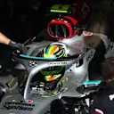 MONZA, ITALY - SEPTEMBER 10: Lewis Hamilton of Great Britain driving the (44) Mercedes AMG Petronas F1 Team W13 is pushed back into the garage during qualifying ahead of the F1 Grand Prix of Italy at Autodromo Nazionale Monza on September 10, 2022 in Monza, Italy. (Photo by Dan Istitene - Formula 1/Formula 1 via Getty Images)