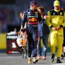 MONZA, ITALY - SEPTEMBER 10: Second placed qualifier Max Verstappen of the Netherlands and Oracle Red Bull Racing and Third placed qualifier Carlos Sainz of Spain and Ferrari talk in parc ferme during qualifying ahead of the F1 Grand Prix of Italy at Autodromo Nazionale Monza on September 10, 2022 in Monza, Italy. (Photo by Mark Thompson/Getty Images)