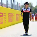 MONZA, ITALY - SEPTEMBER 11: Zhou Guanyu of China and Alfa Romeo F1 looks on from the drivers parade prior to the F1 Grand Prix of Italy at Autodromo Nazionale Monza on September 11, 2022 in Monza, Italy. (Photo by Dan Mullan/Getty Images)