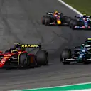MONZA, ITALY - SEPTEMBER 11: Carlos Sainz of Spain driving (55) the Ferrari F1-75 leads Sebastian Vettel of Germany driving the (5) Aston Martin AMR22 Mercedes during the F1 Grand Prix of Italy at Autodromo Nazionale Monza on September 11, 2022 in Monza, Italy. (Photo by Alex Pantling - Formula 1/Formula 1 via Getty Images)
