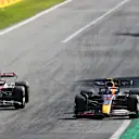 MONZA, ITALY - SEPTEMBER 11: Sergio Perez of Mexico driving the (11) Oracle Red Bull Racing RB18 and Valtteri Bottas of Finland driving the (77) Alfa Romeo F1 C42 Ferrari battle for track position during the F1 Grand Prix of Italy at Autodromo Nazionale Monza on September 11, 2022 in Monza, Italy. (Photo by Joe Portlock - Formula 1/Formula 1 via Getty Images)