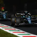 MONZA, ITALY - SEPTEMBER 11: Lance Stroll of Canada driving the (18) Aston Martin AMR22 Mercedes leads Sebastian Vettel of Germany driving the (5) Aston Martin AMR22 Mercedes during the F1 Grand Prix of Italy at Autodromo Nazionale Monza on September 11, 2022 in Monza, Italy. (Photo by Dan Mullan/Getty Images)