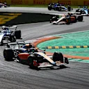 MONZA, ITALY - SEPTEMBER 11: Daniel Ricciardo of Australia driving the (3) McLaren MCL36 Mercedes leads Pierre Gasly of France driving the (10) Scuderia AlphaTauri AT03 during the F1 Grand Prix of Italy at Autodromo Nazionale Monza on September 11, 2022 in Monza, Italy. (Photo by Mark Thompson/Getty Images)