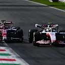 MONZA, ITALY - SEPTEMBER 11: Valtteri Bottas of Finland driving the (77) Alfa Romeo F1 C42 Ferrari runs wide as he and Mick Schumacher of Germany and Haas F1 battle for track position during the F1 Grand Prix of Italy at Autodromo Nazionale Monza on September 11, 2022 in Monza, Italy. (Photo by Clive Mason/Getty Images)
