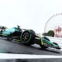 SUZUKA, JAPAN - OCTOBER 07: Lance Stroll of Canada driving the (18) Aston Martin AMR22 Mercedes on track during practice ahead of the F1 Grand Prix of Japan at Suzuka International Racing Course on October 07, 2022 in Suzuka, Japan. (Photo by Clive Rose/Getty Images)