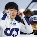 SUZUKA, JAPAN - OCTOBER 07: Yuki Tsunoda of Japan and Scuderia AlphaTauri prepares to drive in the garage during practice ahead of the F1 Grand Prix of Japan at Suzuka International Racing Course on October 07, 2022 in Suzuka, Japan. (Photo by Clive Rose/Getty Images)