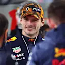SUZUKA, JAPAN - OCTOBER 07: Max Verstappen of the Netherlands and Oracle Red Bull Racing talks with his team in the garage during practice ahead of the F1 Grand Prix of Japan at Suzuka International Racing Course on October 07, 2022 in Suzuka, Japan. (Photo by Dan Istitene - Formula 1/Formula 1 via Getty Images)