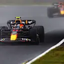 SUZUKA, JAPAN - OCTOBER 07: Sergio Perez of Mexico driving the (11) Oracle Red Bull Racing RB18 leads Max Verstappen of the Netherlands driving the (1) Oracle Red Bull Racing RB18 during practice ahead of the F1 Grand Prix of Japan at Suzuka International Racing Course on October 07, 2022 in Suzuka, Japan. (Photo by Clive Rose/Getty Images)