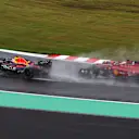 SUZUKA, JAPAN - OCTOBER 09: Max Verstappen of the Netherlands driving the (1) Oracle Red Bull Racing RB18 leads Charles Leclerc of Monaco driving the (16) Ferrari F1-75 on lap one during the F1 Grand Prix of Japan at Suzuka International Racing Course on October 09, 2022 in Suzuka, Japan. (Photo by Clive Rose/Getty Images)
