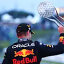 SUZUKA, JAPAN - OCTOBER 09: Race winner and 2022 F1 World Drivers Champion Max Verstappen of the Netherlands and Oracle Red Bull Racing celebrates on the podium during the F1 Grand Prix of Japan at Suzuka International Racing Course on October 09, 2022 in Suzuka, Japan. (Photo by Dan Istitene - Formula 1/Formula 1 via Getty Images)