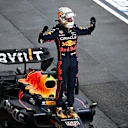 SUZUKA, JAPAN - OCTOBER 09: Race winner and 2022 F1 World Drivers Champion Max Verstappen of Netherlands and Oracle Red Bull Racing celebrates in parc ferme during the F1 Grand Prix of Japan at Suzuka International Racing Course on October 09, 2022 in Suzuka, Japan. (Photo by Clive Mason/Getty Images)