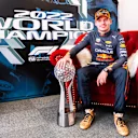 SUZUKA, JAPAN - OCTOBER 09: Race winner and 2022 F1 World Drivers Champion Max Verstappen of Netherlands and Oracle Red Bull Racing poses for a photo after the F1 Grand Prix of Japan at Suzuka International Racing Course on October 09, 2022 in Suzuka, Japan. (Photo by Dan Istitene - Formula 1/Formula 1 via Getty Images)