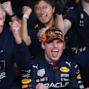 SUZUKA, JAPAN - OCTOBER 09: Race winner and 2022 F1 World Drivers Champion Max Verstappen of Netherlands and Oracle Red Bull Racing celebrates with his team after the F1 Grand Prix of Japan at Suzuka International Racing Course on October 09, 2022 in Suzuka, Japan. (Photo by Bryn Lennon - Formula 1/Formula 1 via Getty Images)