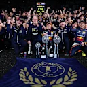 SUZUKA, JAPAN - OCTOBER 09: Race winner and 2022 F1 World Drivers Champion Max Verstappen of Netherlands and Oracle Red Bull Racing celebrates with his team after the F1 Grand Prix of Japan at Suzuka International Racing Course on October 09, 2022 in Suzuka, Japan. (Photo by Dan Istitene - Formula 1/Formula 1 via Getty Images)