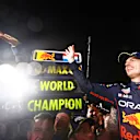 SUZUKA, JAPAN - OCTOBER 09: Race winner and 2022 F1 World Drivers Champion Max Verstappen of Netherlands and Oracle Red Bull Racing celebrates with his team after the F1 Grand Prix of Japan at Suzuka International Racing Course on October 09, 2022 in Suzuka, Japan. (Photo by Mark Thompson/Getty Images )