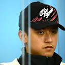 SUZUKA, JAPAN - OCTOBER 06: Zhou Guanyu of China and Alfa Romeo F1 attends the Drivers Press Conference during previews ahead of the F1 Grand Prix of Japan at Suzuka International Racing Course on October 06, 2022 in Suzuka, Japan. (Photo by Clive Mason/Getty Images)