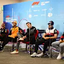 SUZUKA, JAPAN - OCTOBER 06: Max Verstappen of the Netherlands and Oracle Red Bull Racing, Daniel Ricciardo of Australia and McLaren, George Russell of Great Britain and Mercedes, Zhou Guanyu of China and Alfa Romeo F1 and Charles Leclerc of Monaco and Ferrari attend the Drivers Press Conference during previews ahead of the F1 Grand Prix of Japan at Suzuka International Racing Course on October 06, 2022 in Suzuka, Japan. (Photo by Clive Mason/Getty Images)