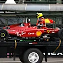 MEXICO CITY, MEXICO - OCTOBER 28: The car of Charles Leclerc of Monaco and Ferrari is brought back to the pitlane after a crash during practice ahead of the F1 Grand Prix of Mexico at Autodromo Hermanos Rodriguez on October 28, 2022 in Mexico City, Mexico. (Photo by Chris Graythen/Getty Images)