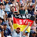 MEXICO CITY, MEXICO - OCTOBER 28: Sebastian Vettel of Germany and Aston Martin F1 Team fans show their support during practice ahead of the F1 Grand Prix of Mexico at Autodromo Hermanos Rodriguez on October 28, 2022 in Mexico City, Mexico. (Photo by Jared C. Tilton/Getty Images)