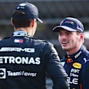 MEXICO CITY, MEXICO - OCTOBER 29: Pole position qualifier Max Verstappen of the Netherlands and Oracle Red Bull Racing and Second placed qualifier George Russell of Great Britain and Mercedes talk in parc ferme during qualifying ahead of the F1 Grand Prix of Mexico at Autodromo Hermanos Rodriguez on October 29, 2022 in Mexico City, Mexico. (Photo by Clive Mason - Formula 1/Formula 1 via Getty Images)