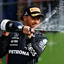 MEXICO CITY, MEXICO - OCTOBER 30: Second placed Lewis Hamilton of Great Britain and Mercedes celebrates on the podium during the F1 Grand Prix of Mexico at Autodromo Hermanos Rodriguez on October 30, 2022 in Mexico City, Mexico. (Photo by Chris Graythen/Getty Images)