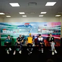 MEXICO CITY, MEXICO - OCTOBER 27: (L-R) Sebastian Vettel of Germany and Aston Martin F1 Team, Nicholas Latifi of Canada and Williams, Daniel Ricciardo of Australia and McLaren, Yuki Tsunoda of Japan and Scuderia AlphaTauri and George Russell of Great Britain and Mercedes attend the Drivers Press Conference during previews ahead of the F1 Grand Prix of Mexico at Autodromo Hermanos Rodriguez on October 27, 2022 in Mexico City, Mexico. (Photo by Jared C. Tilton/Getty Images)