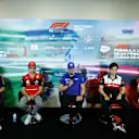 MEXICO CITY, MEXICO - OCTOBER 27: (L-R) Sergio Perez of Mexico and Oracle Red Bull Racing, Charles Leclerc of Monaco and Ferrari, Mick Schumacher of Germany and Haas F1, Zhou Guanyu of China and Alfa Romeo F1 and Fernando Alonso of Spain and Alpine F1 attend the Drivers Press Conference  during previews ahead of the F1 Grand Prix of Mexico at Autodromo Hermanos Rodriguez on October 27, 2022 in Mexico City, Mexico. (Photo by Jared C. Tilton/Getty Images)