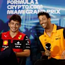 MIAMI, FLORIDA - MAY 06: Charles Leclerc of Monaco and Ferrari and Daniel Ricciardo of Australia and McLaren smile in the Drivers Press Conference prior to practice ahead of the F1 Grand Prix of Miami at the Miami International Autodrome on May 06, 2022 in Miami, Florida. (Photo by Jared C. Tilton/Getty Images)