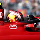 MIAMI, FLORIDA - MAY 07: Second placed qualifier Carlos Sainz of Spain and Ferrari climbs from his car in parc ferme during qualifying ahead of the F1 Grand Prix of Miami at the Miami International Autodrome on May 07, 2022 in Miami, Florida. (Photo by Dan Istitene - Formula 1/Formula 1 via Getty Images)
