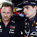 MIAMI, FLORIDA - MAY 07: Max Verstappen of the Netherlands and Oracle Red Bull Racing talks with Red Bull Racing Team Principal Christian Horner in the garage during qualifying ahead of the F1 Grand Prix of Miami at the Miami International Autodrome on May 07, 2022 in Miami, Florida. (Photo by Mark Thompson/Getty Images)