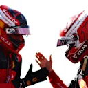 MIAMI, FLORIDA - MAY 07: Pole position qualifier Charles Leclerc of Monaco and Ferrari and Second placed qualifier Carlos Sainz of Spain and Ferrari celebrate in parc ferme during qualifying ahead of the F1 Grand Prix of Miami at the Miami International Autodrome on May 07, 2022 in Miami, Florida. (Photo by Dan Istitene - Formula 1/Formula 1 via Getty Images)