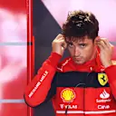 MIAMI, FLORIDA - MAY 07: Charles Leclerc of Monaco and Ferrari prepares to drive in the garage during qualifying ahead of the F1 Grand Prix of Miami at the Miami International Autodrome on May 07, 2022 in Miami, Florida. (Photo by Dan Istitene - Formula 1/Formula 1 via Getty Images)