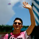 MIAMI, FLORIDA - MAY 08: Esteban Ocon of France and Alpine F1 waves to the crowd from the paddock prior to the F1 Grand Prix of Miami at the Miami International Autodrome on May 08, 2022 in Miami, Florida. (Photo by Jared C. Tilton/Getty Images)