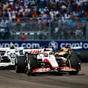 MIAMI, FLORIDA - MAY 08: Kevin Magnussen of Denmark driving the (20) Haas F1 VF-22 Ferrari leads Yuki Tsunoda of Japan driving the (22) Scuderia AlphaTauri AT03 during the F1 Grand Prix of Miami at the Miami International Autodrome on May 08, 2022 in Miami, Florida. (Photo by Jared C. Tilton/Getty Images)