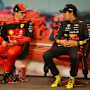 MONTE-CARLO, MONACO - MAY 28: Pole position qualifier Charles Leclerc of Monaco and Ferrari and Third placed qualifier Sergio Perez of Mexico and Oracle Red Bull Racing talk in the press conference after qualifying ahead of the F1 Grand Prix of Monaco at Circuit de Monaco on May 28, 2022 in Monte-Carlo, Monaco. (Photo by Clive Mason/Getty Images)